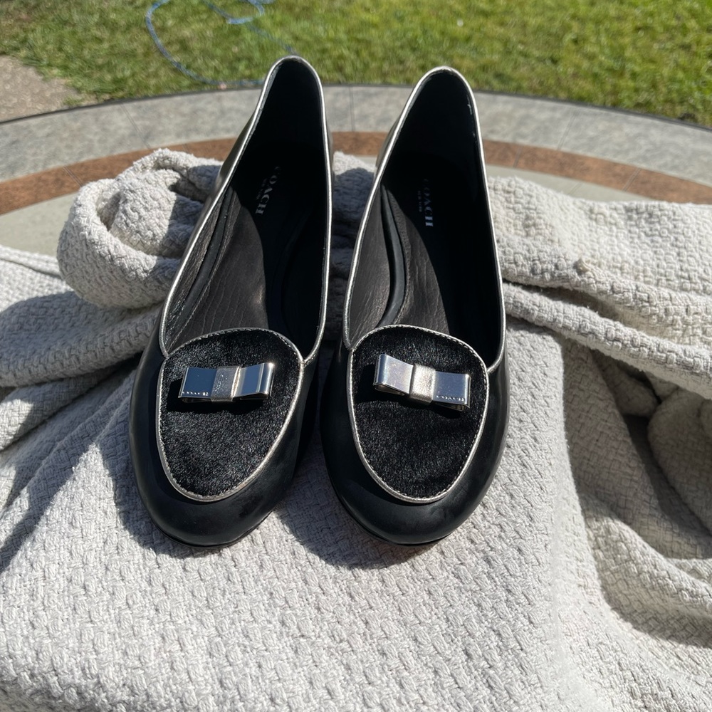 8.5 B leather coach shoes. Never worn. Made out of leather and horse hair.